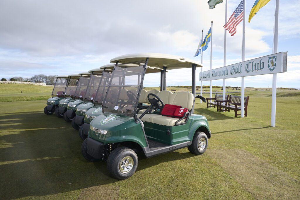 A defibrillator sitting on Royal Dornoch Golf Club's STAR EV Capella.
